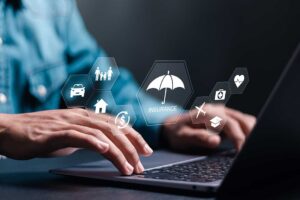 A homeowner photographs furniture and electronics while creating a detailed household inventory.